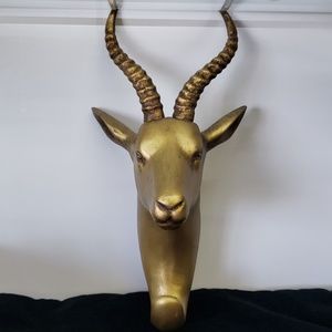 Gold coat or purse wall decoration piece